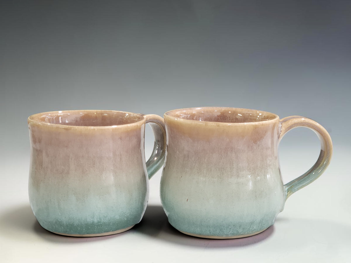Artisan ceramic coffee cup crafted from stoneware clay and finished with unique layered glazing techniques