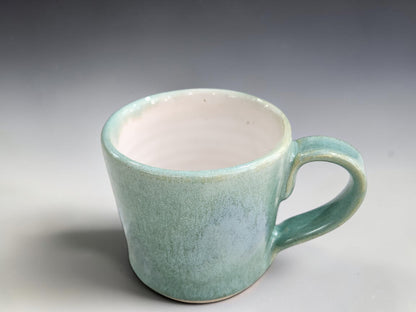 Handmade green ceramic espresso cups with small one-finger handles