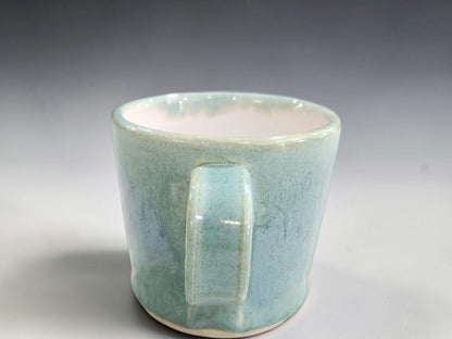 Handmade green ceramic espresso cups with small one-finger handles