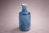 Tall ceramic bud vase with ocean blue glaze and pale crystal blooms, handmade in Melbourne
