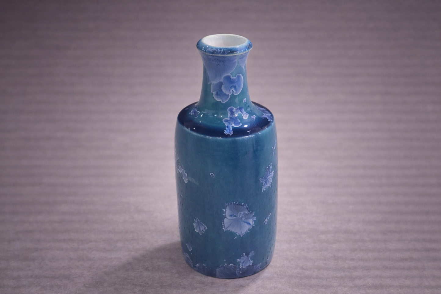Modern bottle-shaped ceramic vase in teal and deep blue tones, artisan pottery Australia