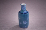 Modern bottle-shaped ceramic vase in teal and deep blue tones, artisan pottery Australia