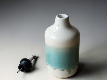 Ceramic kitchen oil dispenser bottle with mint green glaze and speckled finish