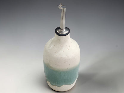 Ceramic kitchen oil dispenser bottle with mint green glaze and speckled finish