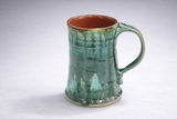 Handmade ceramic mug handle detail view, glossy green glaze, wheel-thrown mug, Melbourne Australia