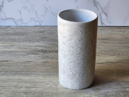 Handmade crystalline pottery tumbler or vase in white glaze