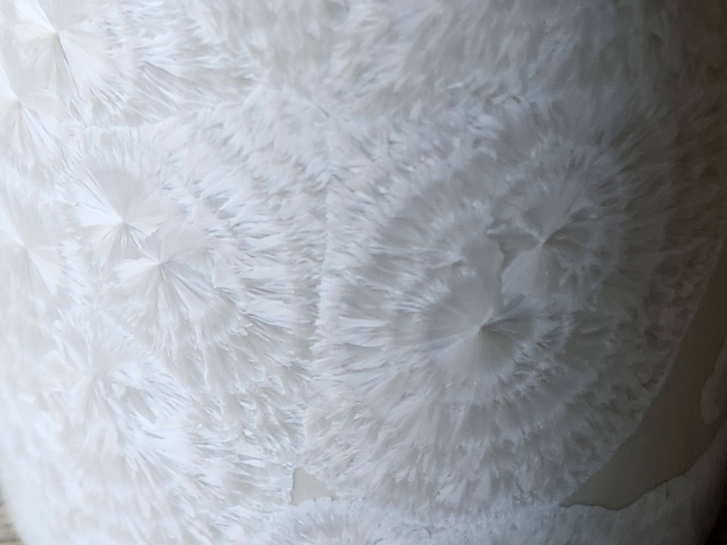 Close up of flower-like crystals on a Handmade Australian crystalline cylinder vase – one-of-a-kind