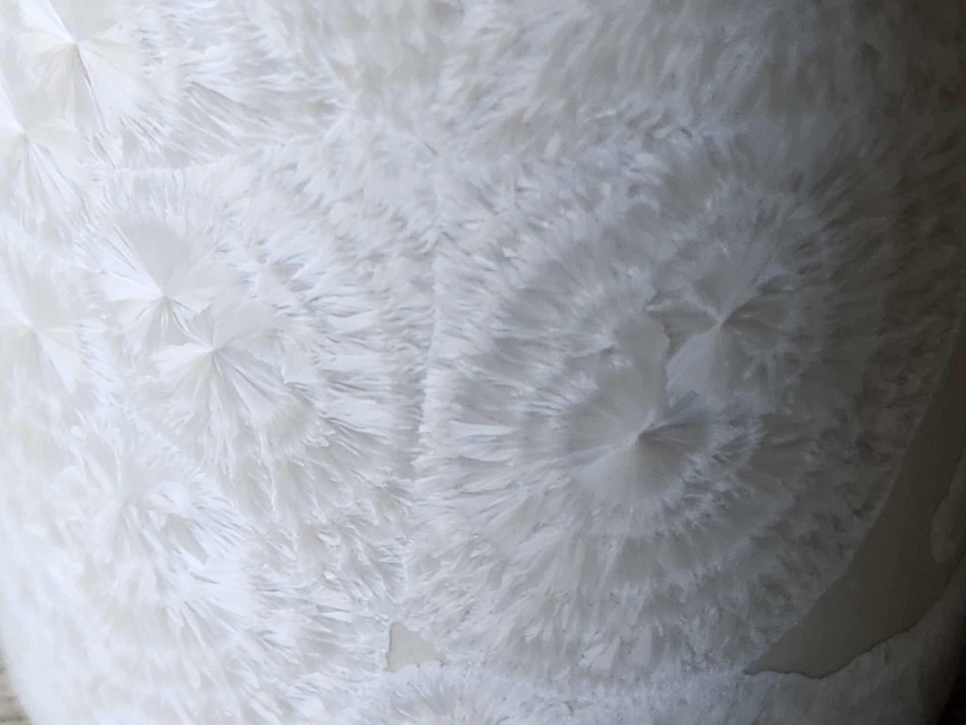 Close up of flower-like crystals on a Handmade Australian crystalline cylinder vase – one-of-a-kind