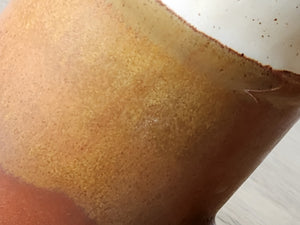  close up of Artisan pottery stein – high-fired ceramic with speckled and earthy finish