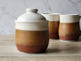 Unique ceramic container with warm, earthy tones and high-fired durability