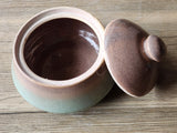 Close-up of lid and glaze detail on handmade pottery sugar bowl