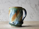 Rustic Handmade Ceramic Mug – 350ml – Green, Amber & Blue Drip Glaze with Red-Brown Interior - Buxton Pottery