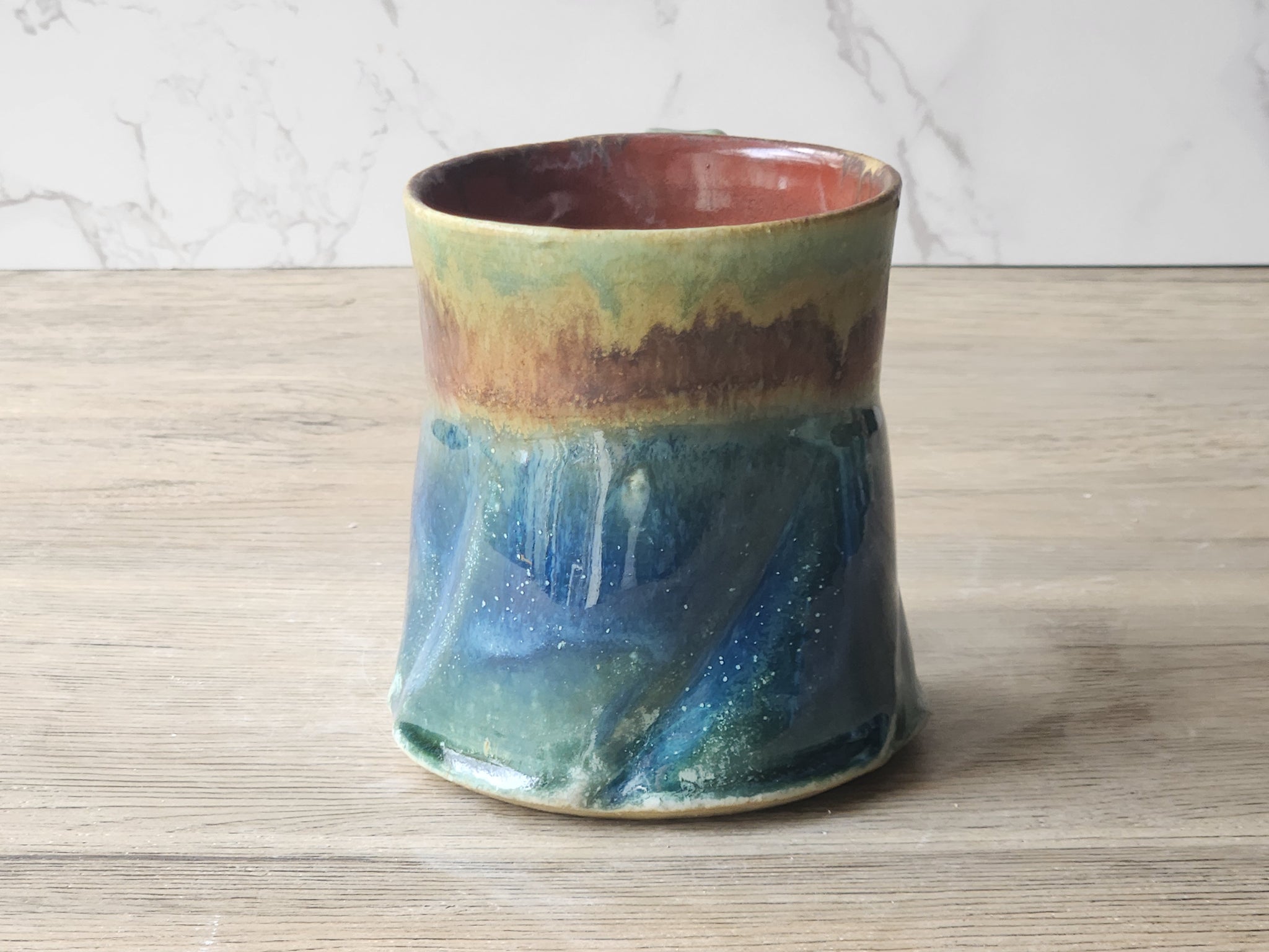 Handmade Rustic Ceramic Mug – 350ml – Altered Form with Red-Brown, Blue & Green Glaze - Buxton Pottery