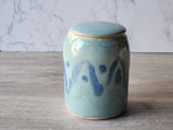 Handmade pottery lidded jar in ocean-inspired glazes. Crafted in Australia. Perfect for storing tea, sugar, spices or keepsakes. One-of-a-kind ceramics.