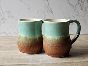Large handmade pottery mug with turquoise and earthy glaze