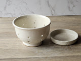 Handmade pottery fruit bowl with matching saucer