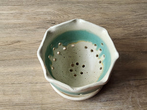 Wheel-thrown stoneware berry bowl with matching drip saucer