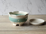 Australian handmade pottery bowl with spearmint green accent