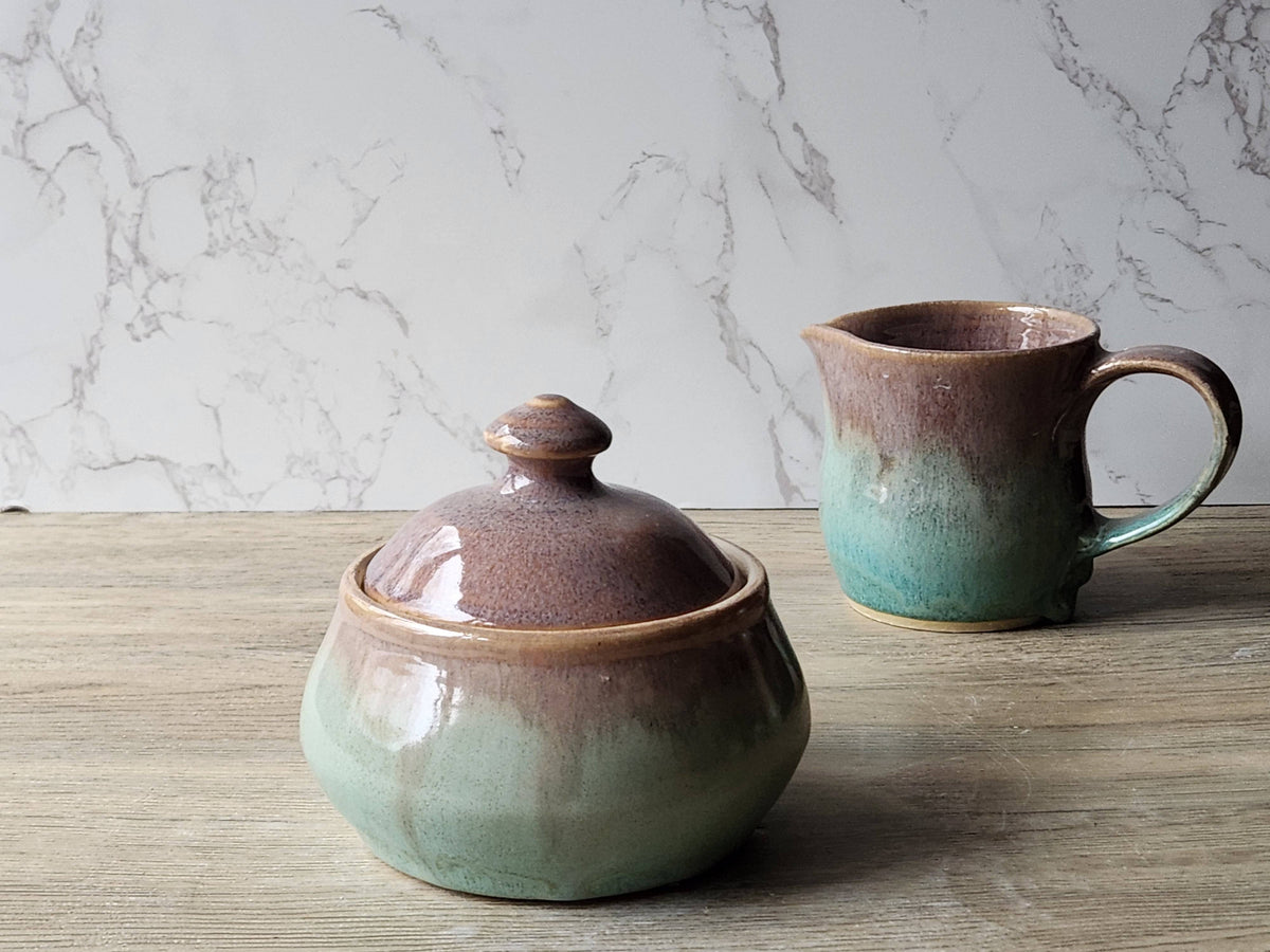 Handmade stoneware jar with oatmeal brown and spearmint green glaze