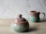 Handmade stoneware jar with oatmeal brown and spearmint green glaze