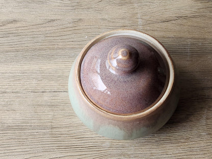 Food-safe ceramic jar with glossy brown and green glaze handmade in Australia.