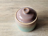 Handmade ceramic jar for kitchen storage or decorative use