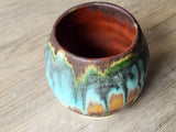 Artisan yunomi pottery cup in rustic glaze combination
