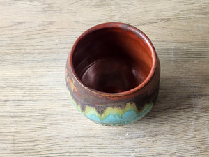 Artisan Japanese inspired pottery cup in rustic glaze combination