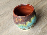 Internal view of Melbourne handmade yunomi tea cup – turquoise and brown and burgandy