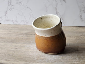 Wheel-thrown ceramic salt pig in earthy glaze