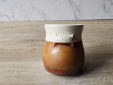 Ceramic salt container with wooden spoon
