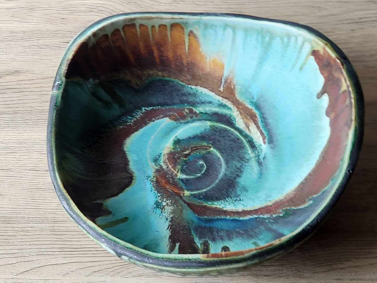 Large stoneware display bowl with turquoise glaze interior