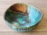 Large stoneware display bowl with turquoise glaze interior
