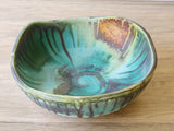 Handmade Artisan pottery serving dish with layered glazes