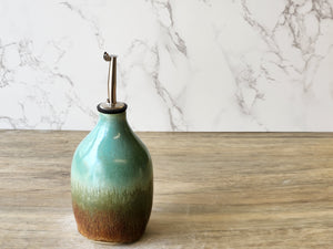 Wheel-thrown pottery oil cruet with food-safe glaze