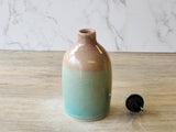 Handmade pottery oil dispenser – keeps oil fresh