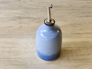 Handmade pottery oil dispenser – keeps oil fresh
