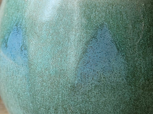 Close up of Rustic handmade yunomi cup with smooth glaze