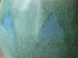Close up of Rustic handmade yunomi cup with smooth glaze