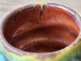 Close up of the burgundy glaze internally on the handmade ceramic teacup.