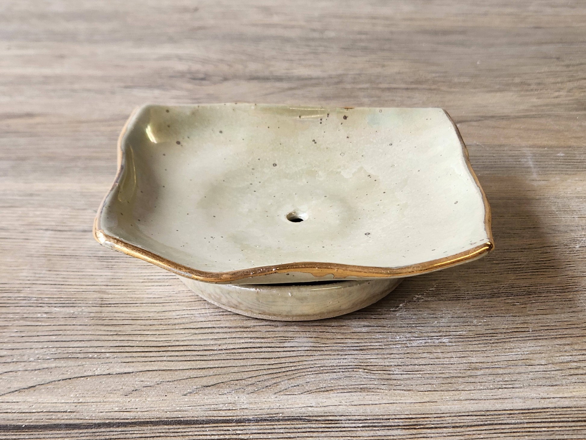 Unique pottery soap dish in cream and pearl glaze