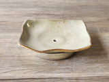 Unique pottery soap dish in cream and pearl glaze