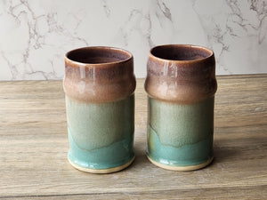 Handmade ceramic steins with earthy natural hues