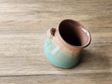Ceramic salt container with wooden spoon