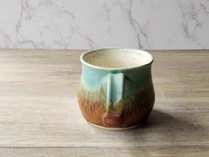 Wheel-thrown stoneware mug with unique glaze pattern