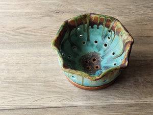 Handmade pottery berry bowl with drainage holes