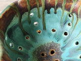Wheel-thrown pottery berry colander with rustic finish