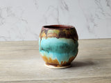 Handmade Artisan tea cup 200ml with organic flowing glaze