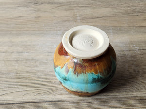 Artisan yunomi teacup with aqua brown finish