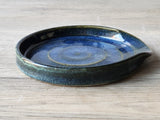Stoneware spoon rest with spiral design